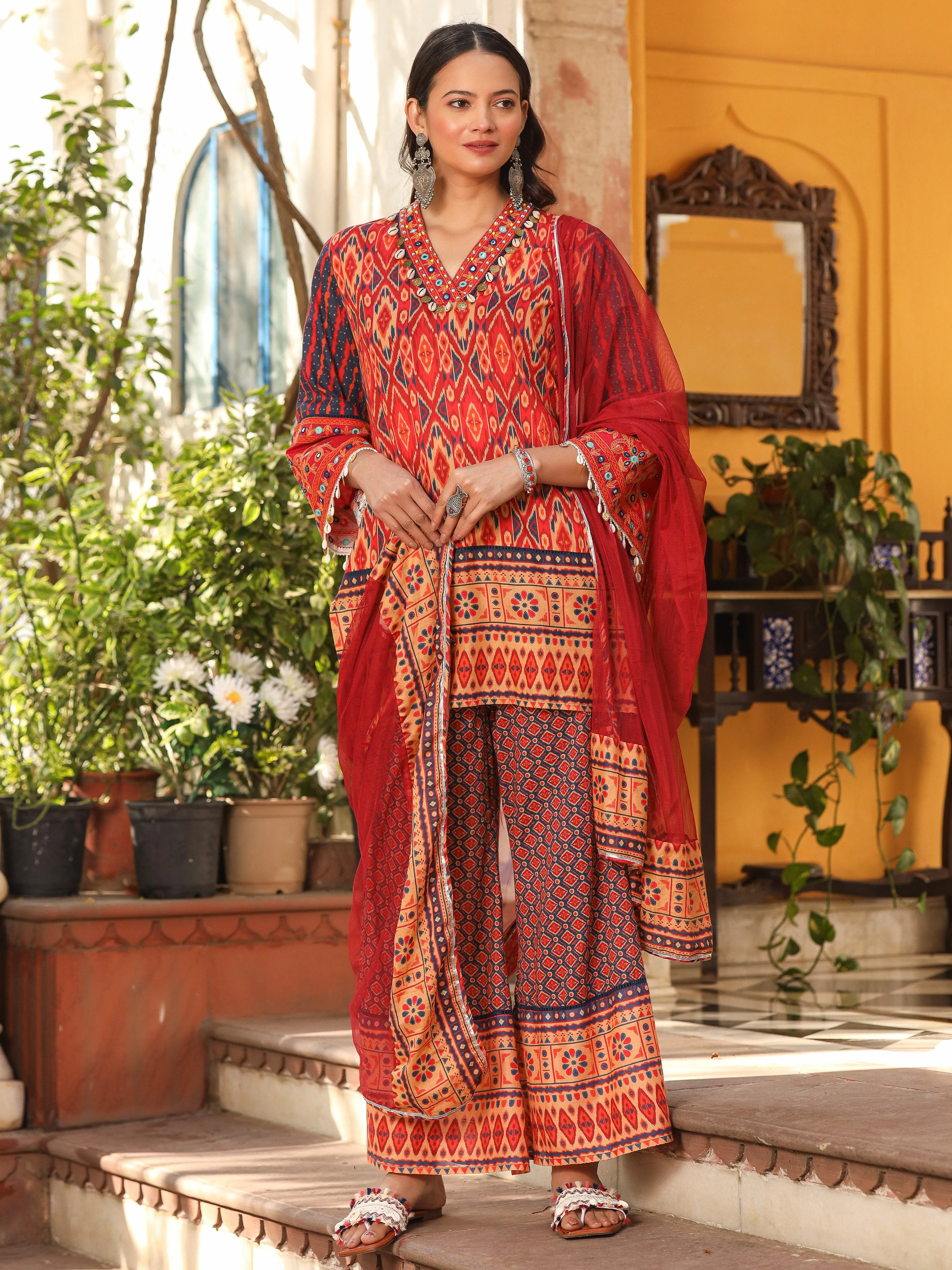 Jashvi Rust Ikat Printed Cotton Voile Kurta Bell Bottom & Dupatta Set  With Coins Kaudis & Mirror Work