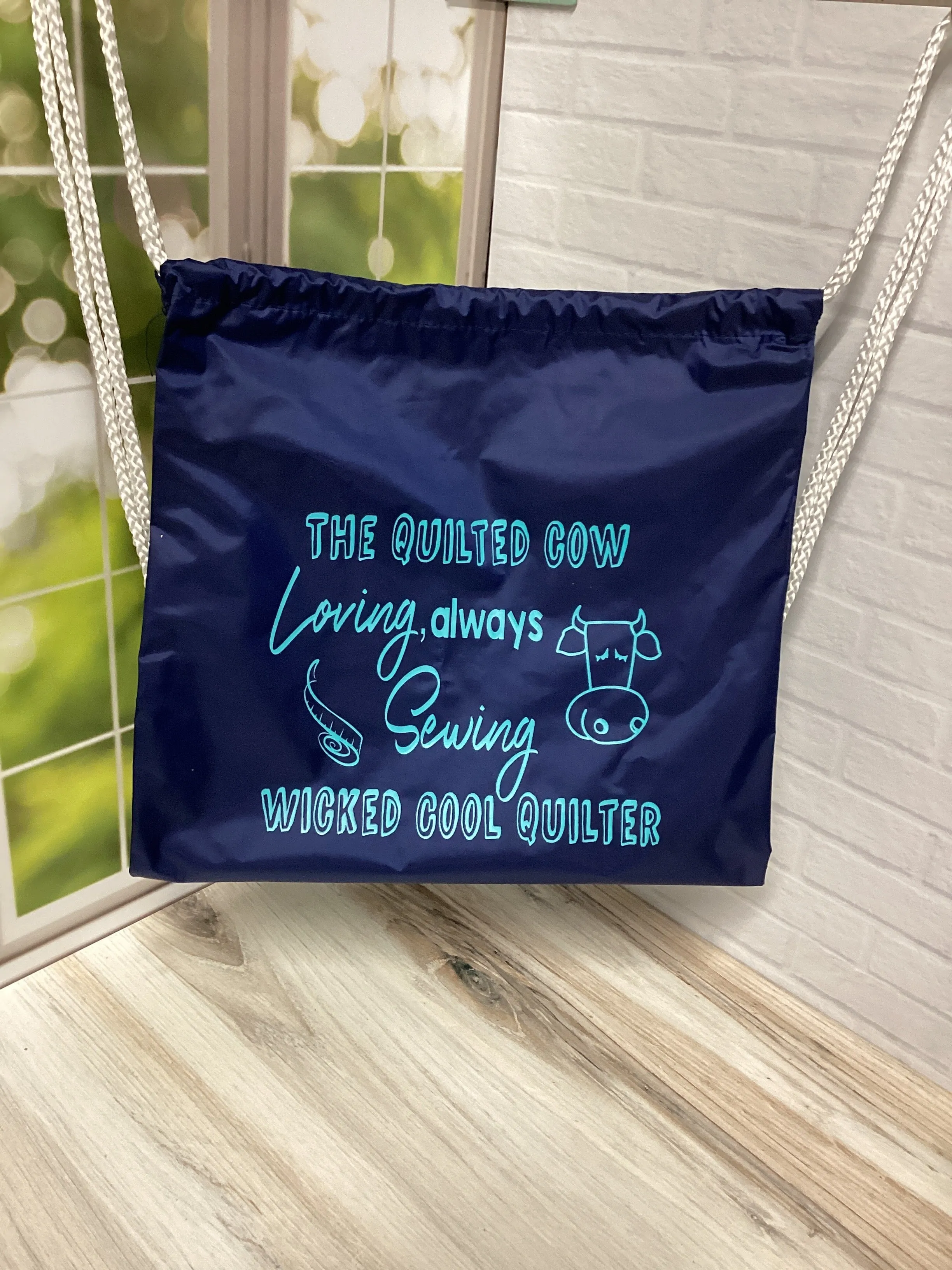 Quilted Cow Drawstring Backpack